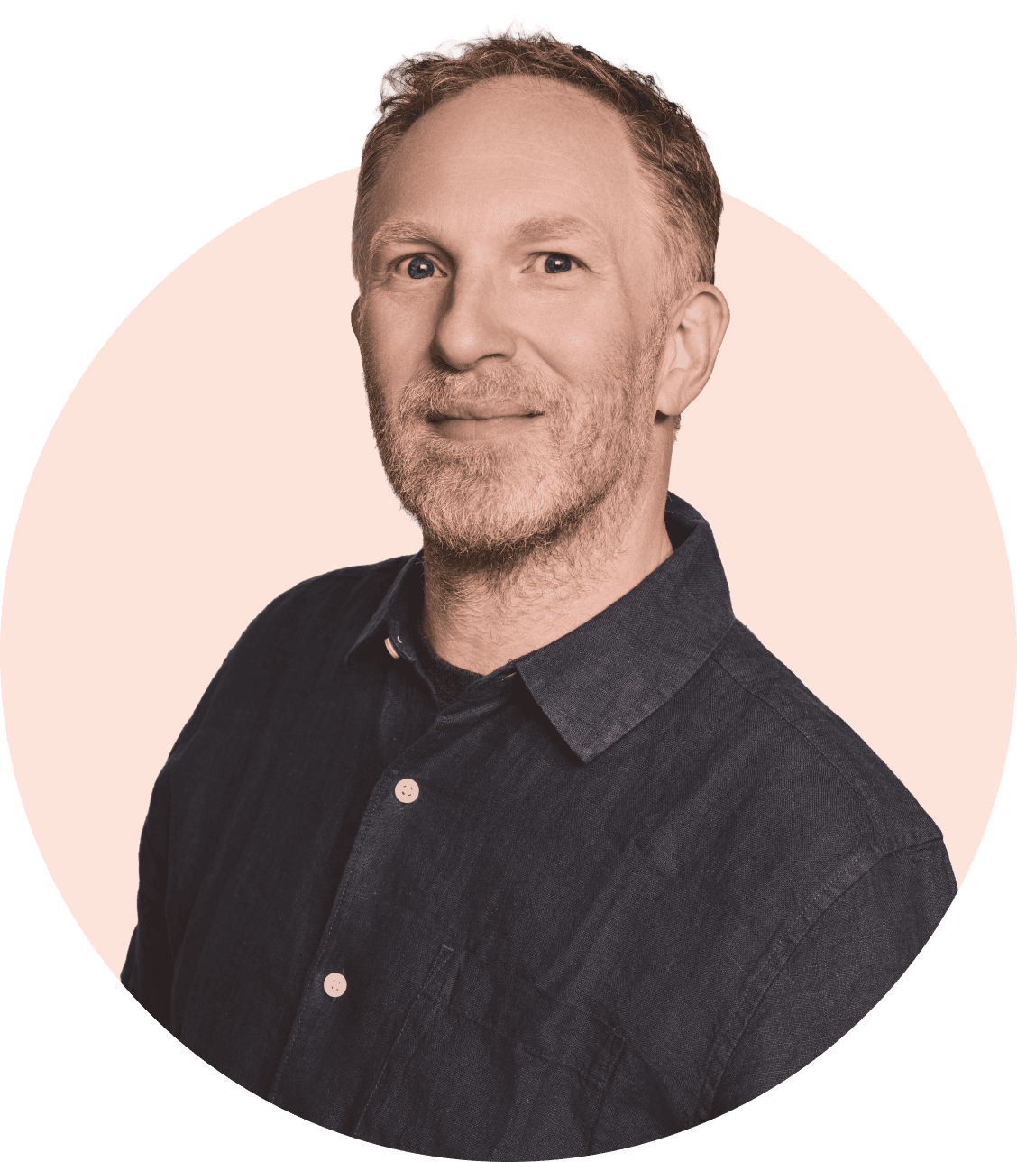 Holler Digital team member smiling, showcasing professional digital marketing expertise.